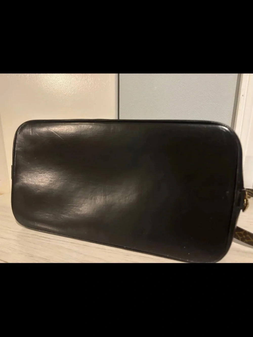 Louis Vuitton Monogram Alma Satchel in Brown with Red Trim